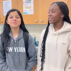 Two teen girls wearing hoodies